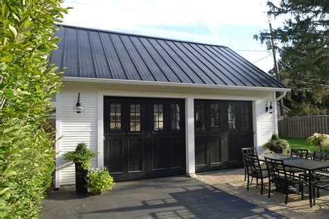 guest house with carport in front of garage metal roof|Exclusive One.